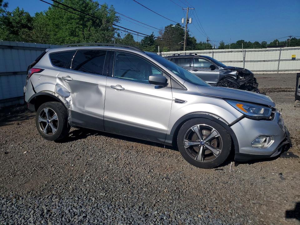 Photo 4 from auction – 2018 FORD ESCAPE with VIN 1FMCU9HD8JUC66420