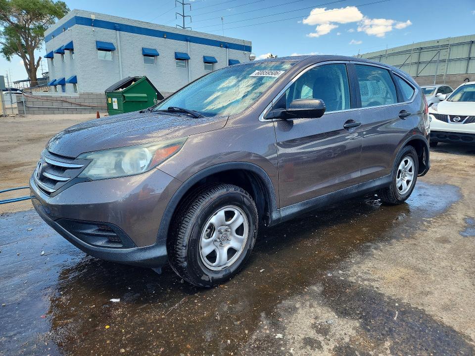 HONDA CR-V 2014 with VIN 2HKRM4H33EH714068 - Photo from auction