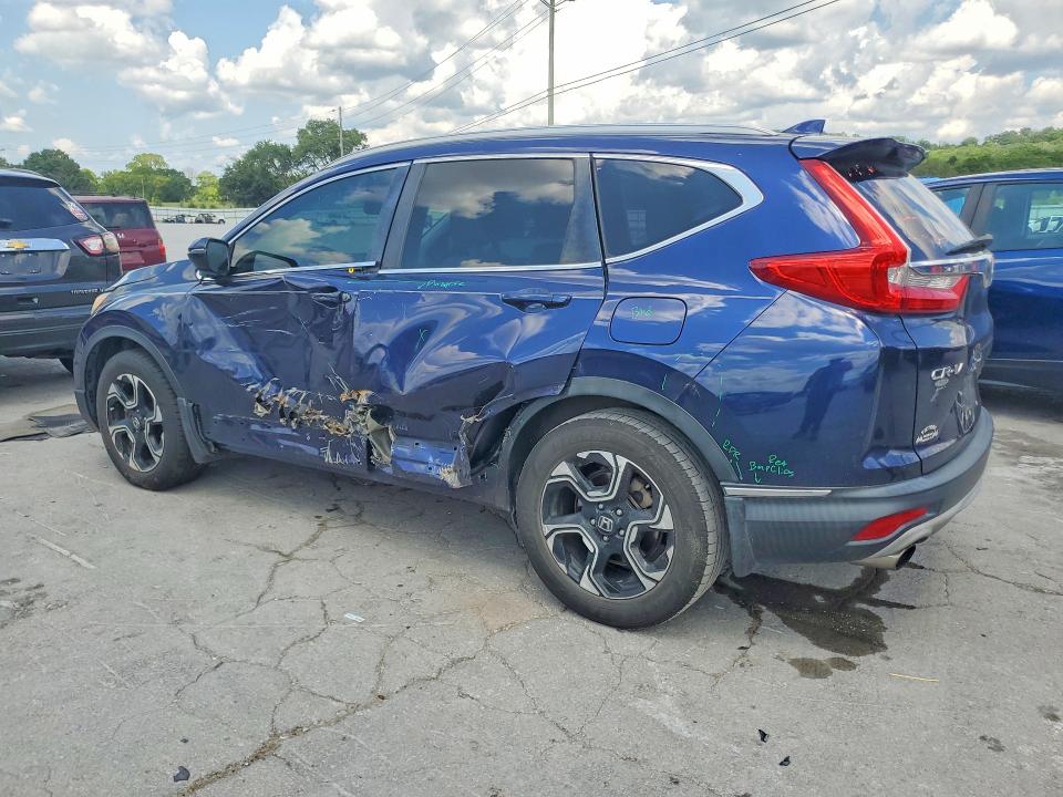 Photo 2 from auction – 2018 HONDA CR-V with VIN 7FARW1H92JE001706
