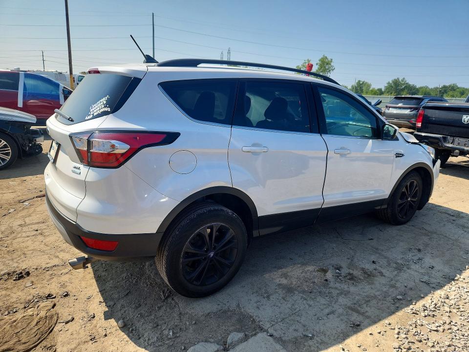 Photo 3 from auction – 2018 FORD ESCAPE with VIN 1FMCU0HD1JUB10361