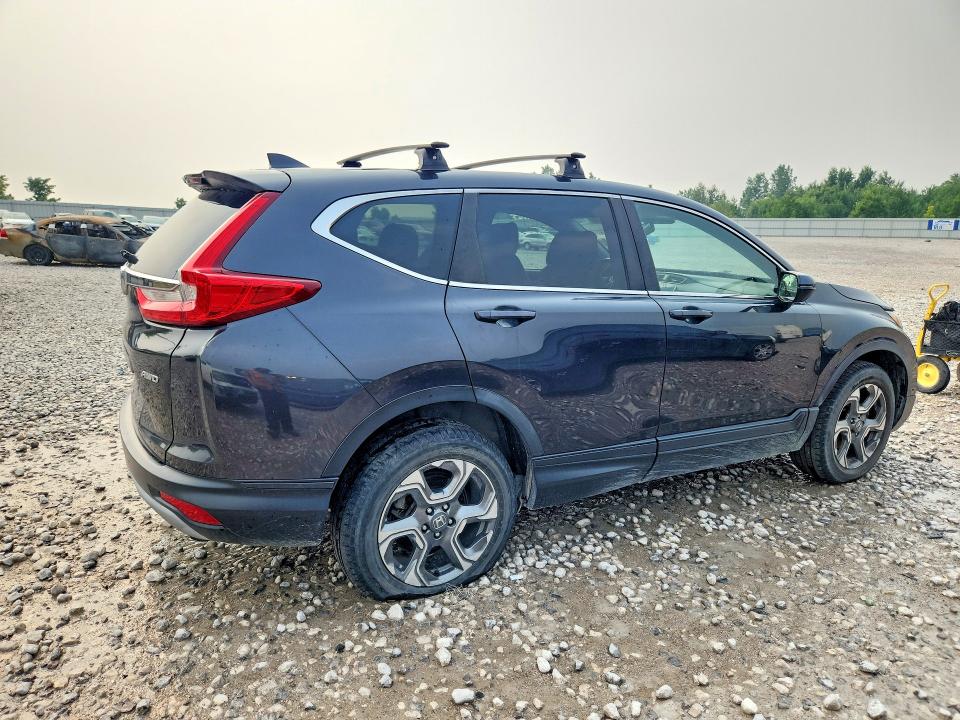 Photo 3 from auction – 2017 HONDA CR-V with VIN 5J6RW2H87HL036512
