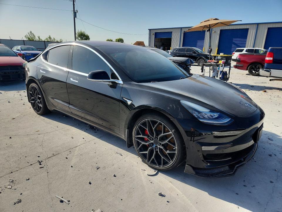Photo 4 from auction – 2018 TESLA MODEL 3 with VIN 5YJ3E1EB6JF074041