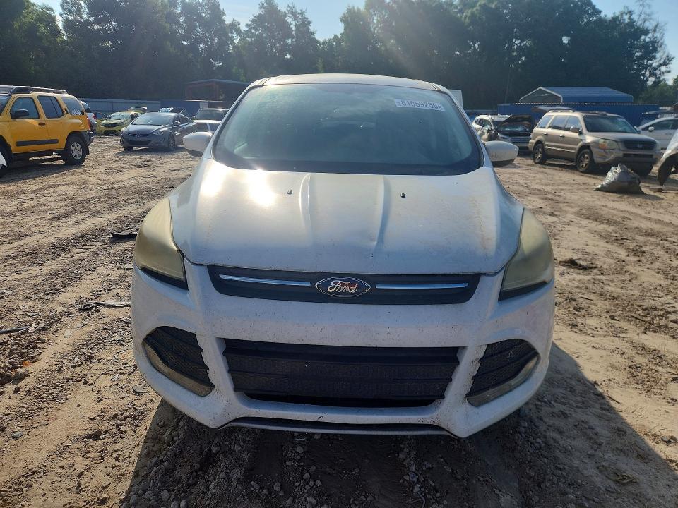 Photo 5 from auction – 2015 FORD ESCAPE with VIN 1FMCU9GX3FUB96991