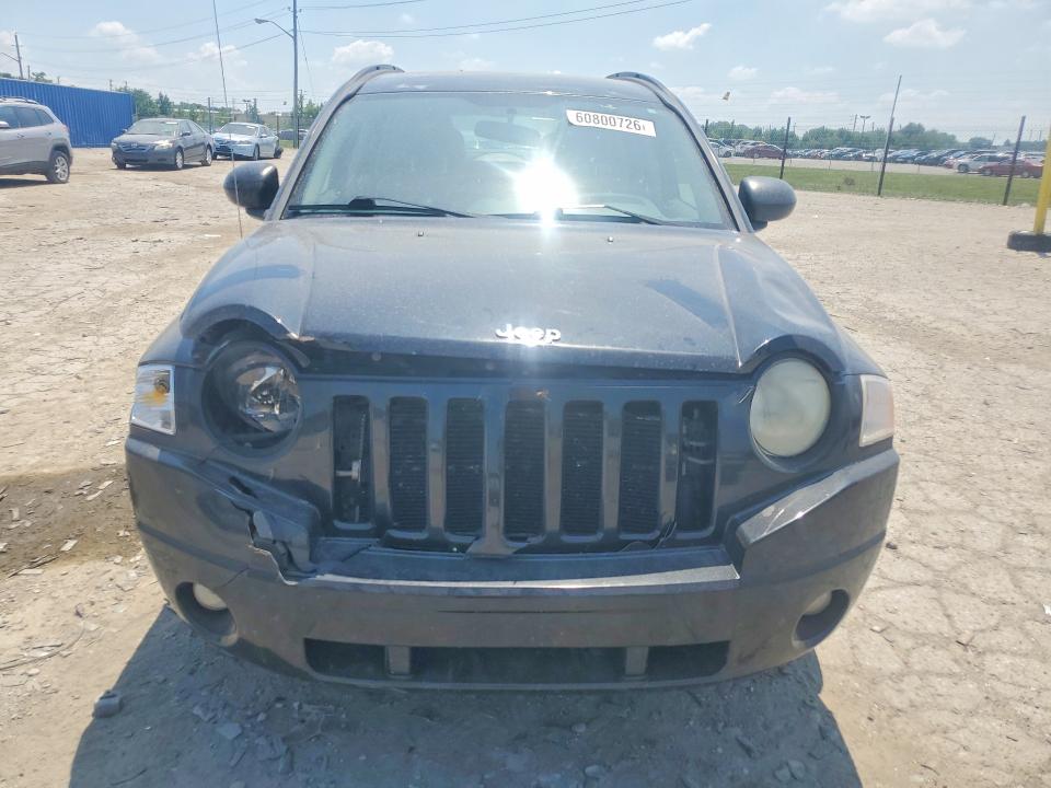 Photo 5 from auction – 2010 JEEP COMPASS with VIN 1J4NT4FB1AD520970