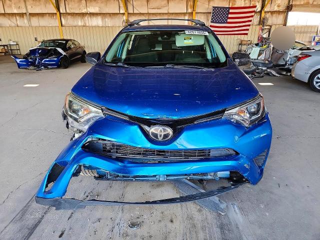 Photo 5 from auction – 2018 TOYOTA RAV4 with VIN JTMZFREV5JJ208191