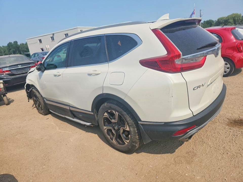 Photo 2 from auction – 2018 HONDA CR-V with VIN 2HKRW2H90JH137948