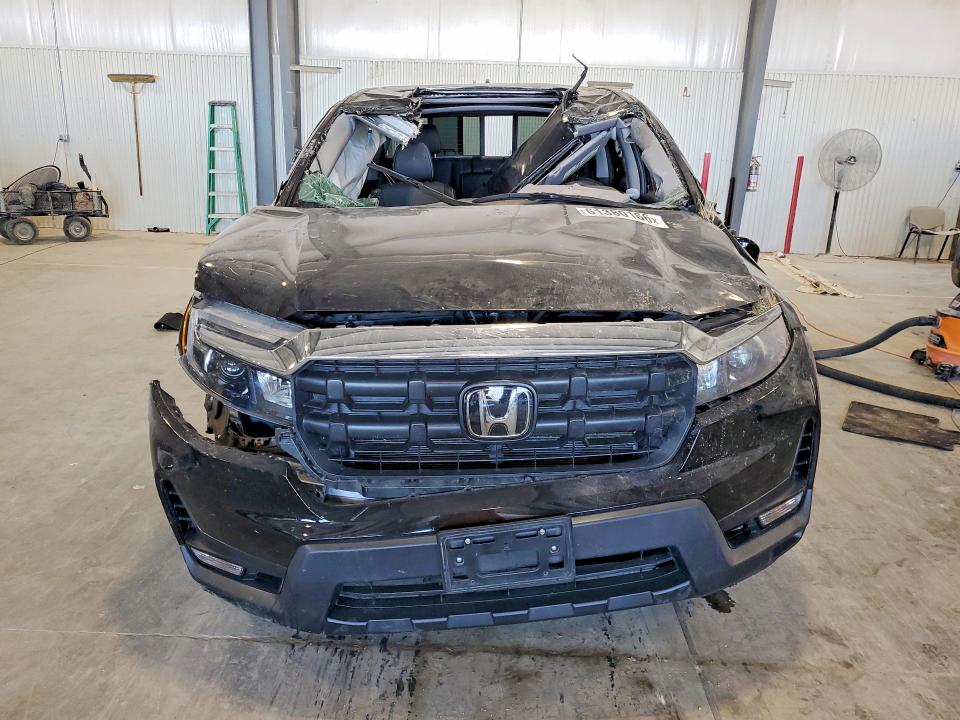 Photo 5 from auction – 2024 HONDA RIDGELINE with VIN 5FPYK3F52RB030852