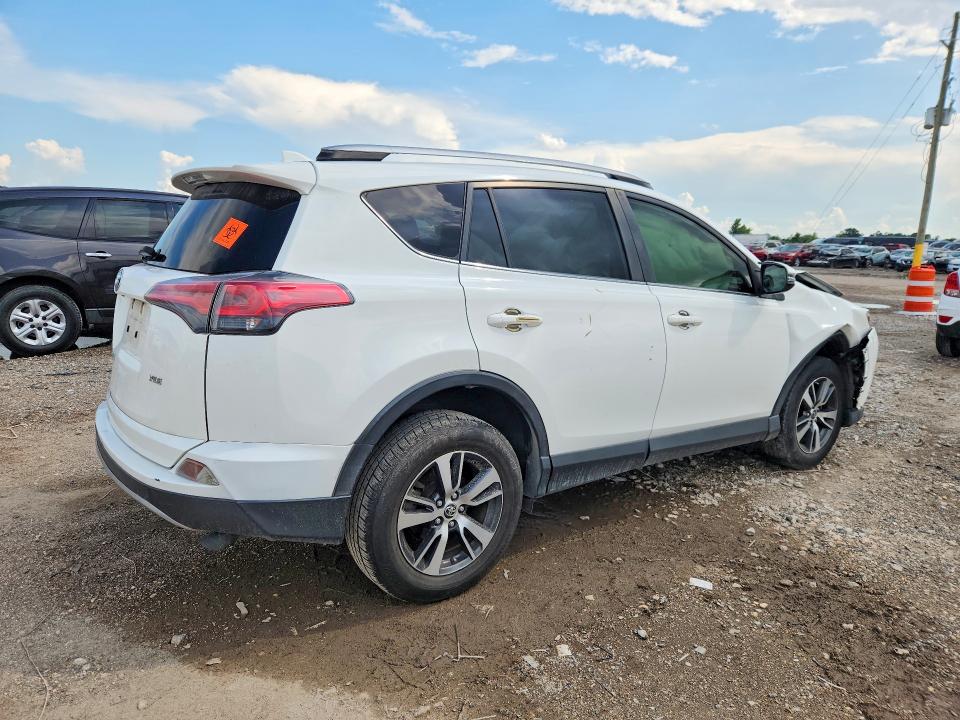 Photo 3 from auction – 2018 TOYOTA RAV4 with VIN JTMWFREV5JJ723078