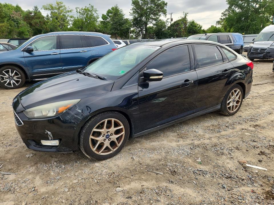 FORD FOCUS 2015 with VIN 1FADP3F24FL283667 - Photo from auction