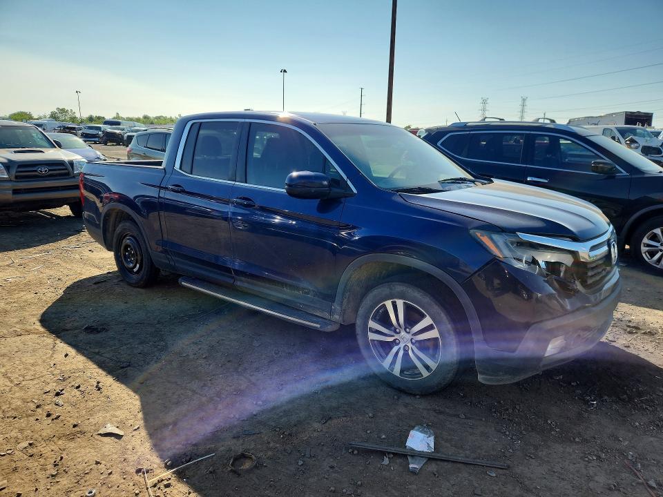 Photo 4 from auction – 2017 HONDA RIDGELINE with VIN 5FPYK2F49HB004734