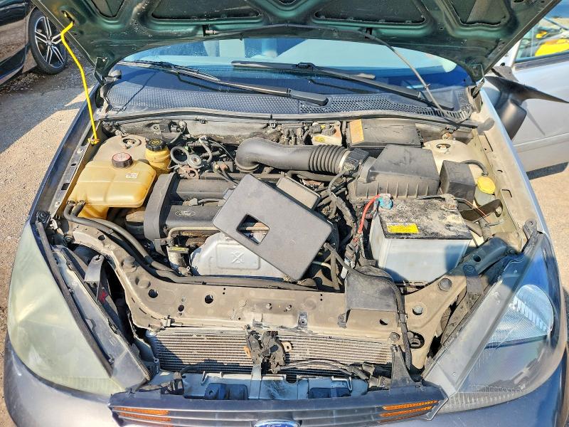 Photo 11 from auction – 2004 FORD FOCUS with VIN 3FAFP37374R112703