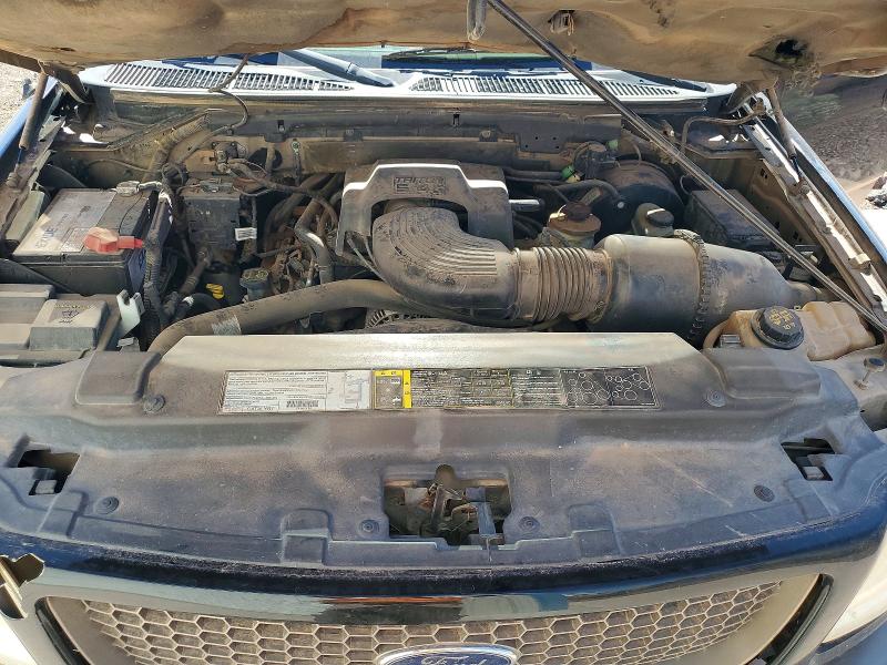 Снимка 11 от търг – 2003 FORD F150 с VIN 1FTRW07L83KB70136