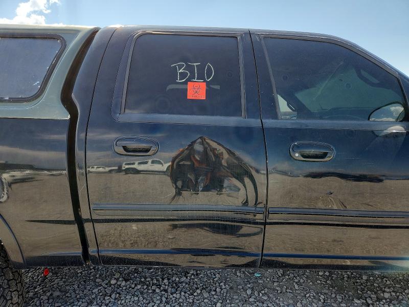 Photo 10 from auction – 2001 FORD F150 with VIN 1FTRW08L01KB55674