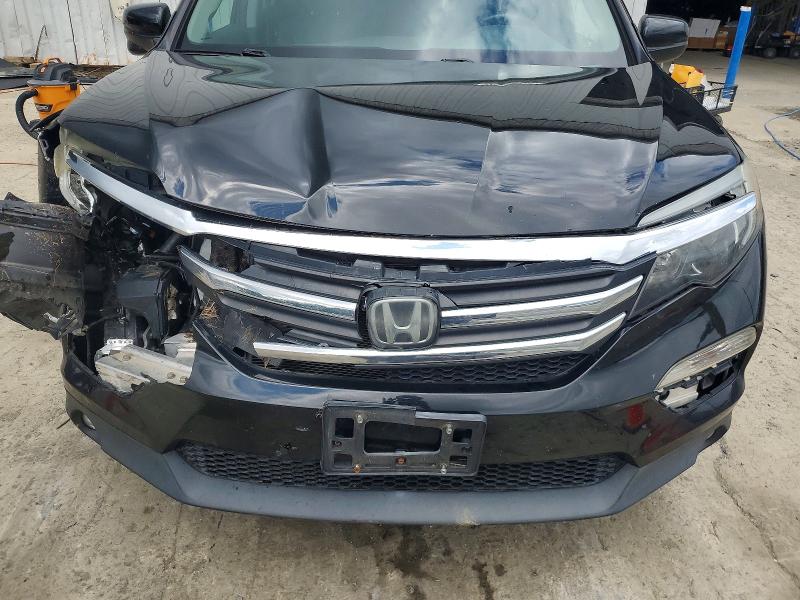 Photo 12 from auction – 2016 HONDA PILOT with VIN 5FNYF6H67GB097240