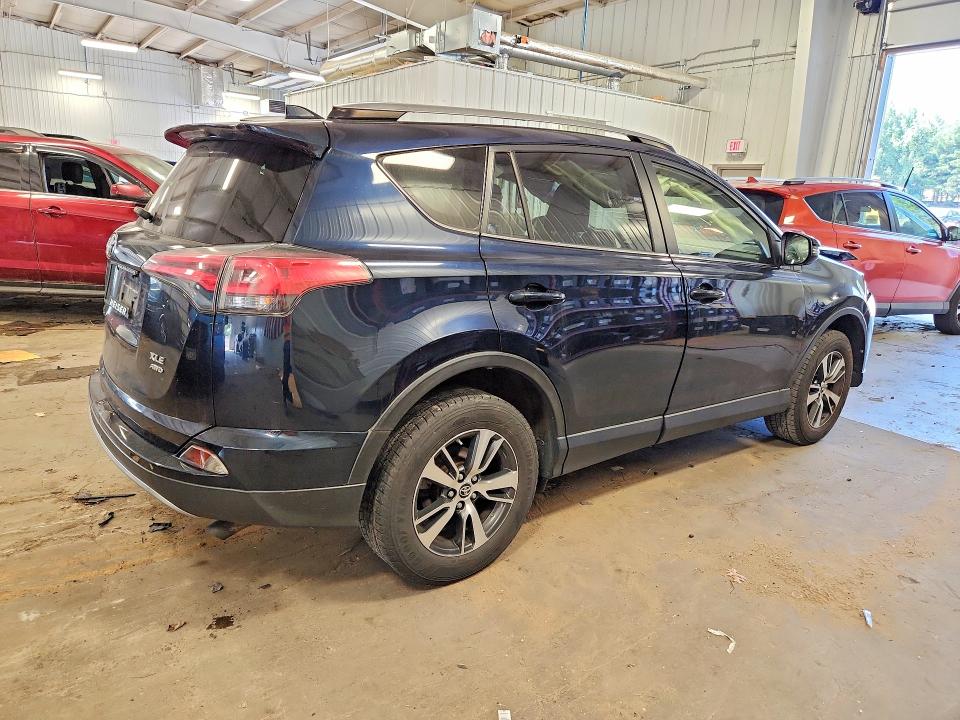 Photo 3 from auction – 2017 TOYOTA RAV4 with VIN JTMRFREV9HJ715993