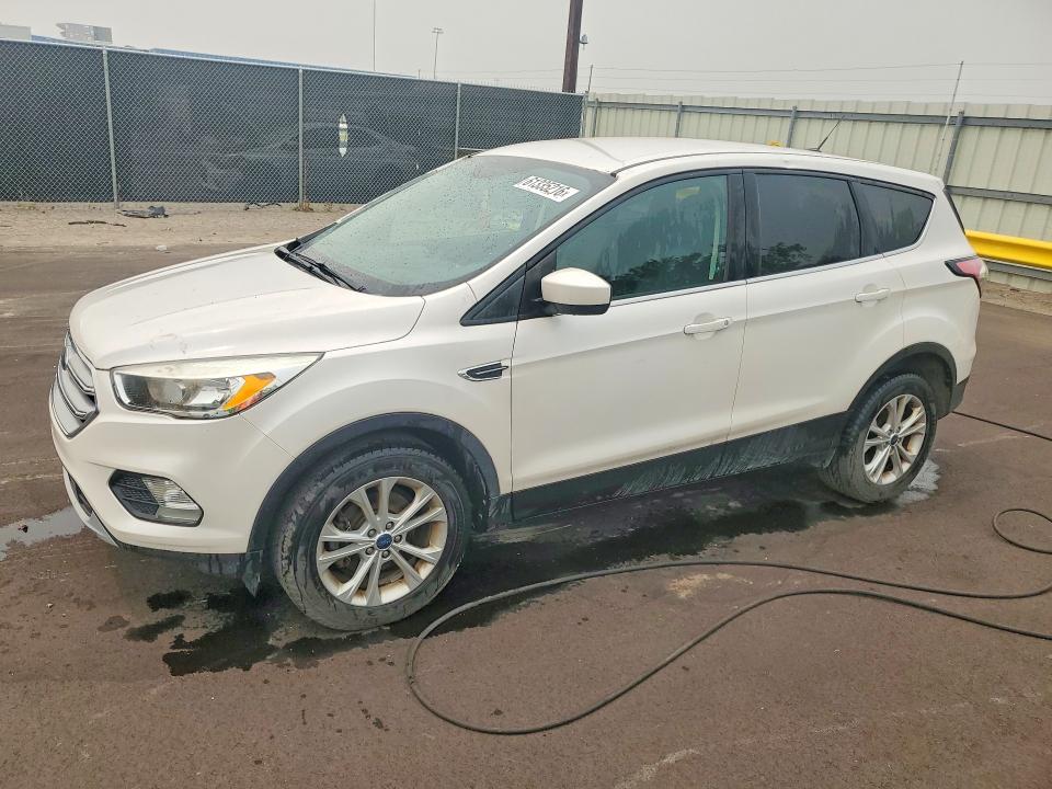 FORD ESCAPE 2017 with VIN 1FMCU0GD7HUD18403 - Photo from auction