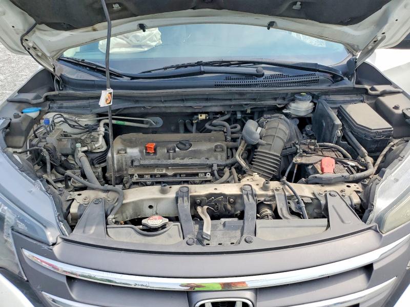 Photo 12 from auction – 2014 HONDA CR-V with VIN 5J6RM4H3XEL105968