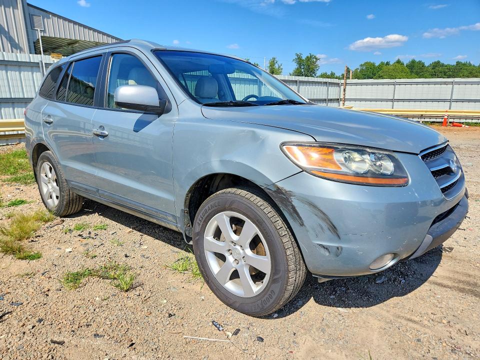 Photo 4 from auction – 2009 HYUNDAI SANTA FE with VIN 5NMSH13E69H299523