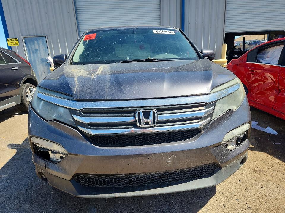 Photo 5 from auction – 2016 HONDA PILOT with VIN 5FNYF6H58GB084990