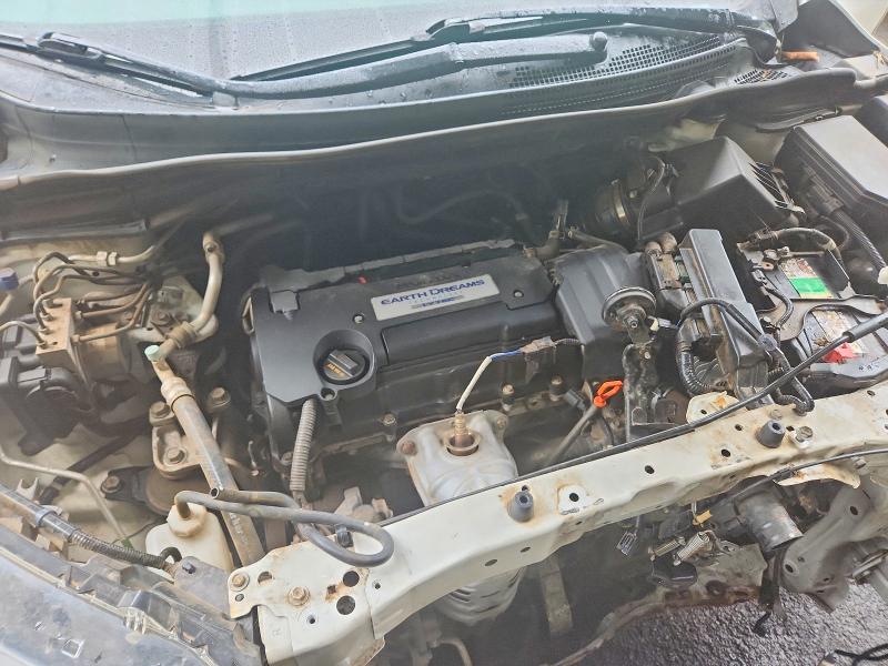 Photo 12 from auction – 2015 HONDA CR-V with VIN 5J6RM4H78FL028280