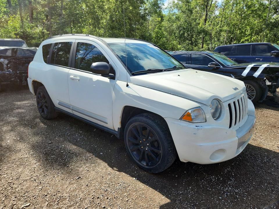 Photo 4 from auction – 2010 JEEP COMPASS with VIN 1J4NF5FB8AD563277