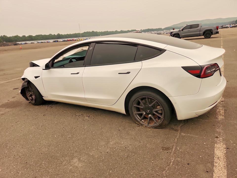 Photo 2 from auction – 2021 TESLA MODEL 3 with VIN 5YJ3E1EA4MF915950