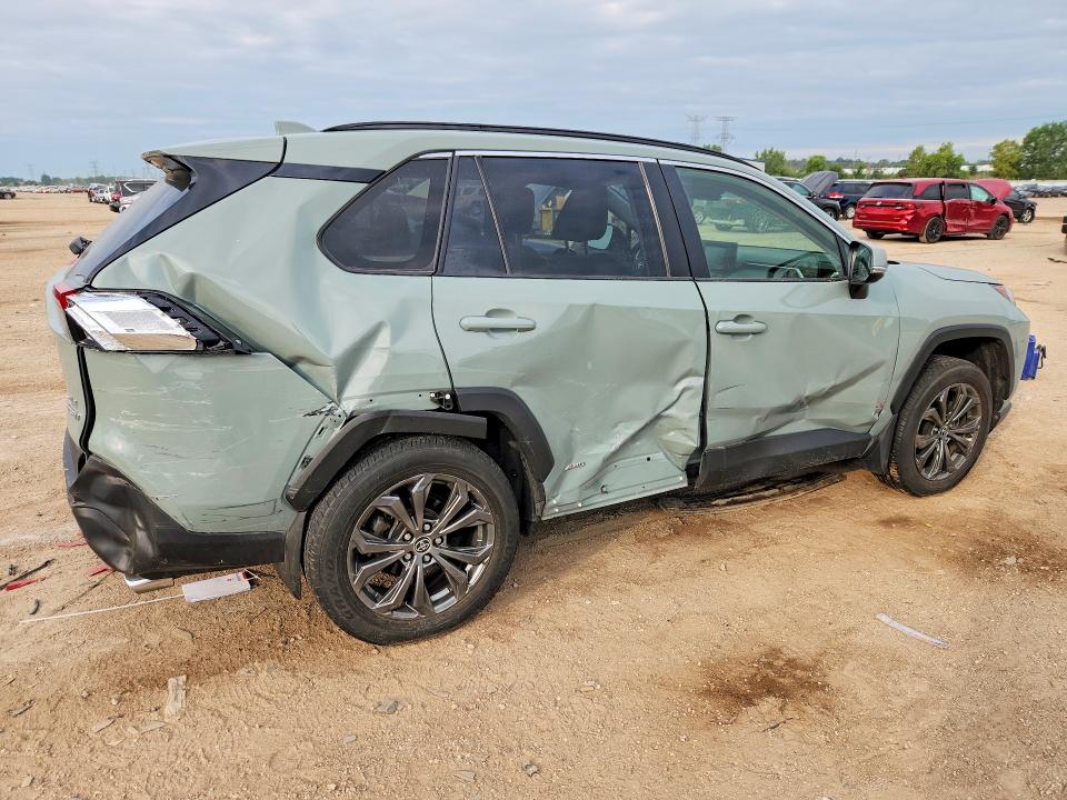 Photo 3 from auction – 2022 TOYOTA RAV4 with VIN JTMB6RFV8ND067282