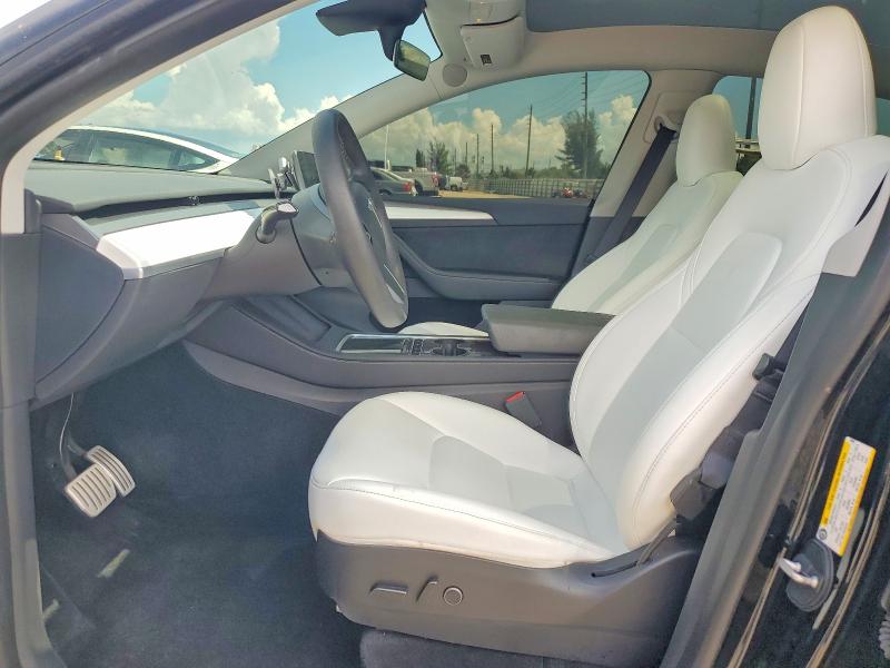 Снимка 7 от търг – 2023 TESLA MODEL Y с VIN 7SAYGDEF8PF704867