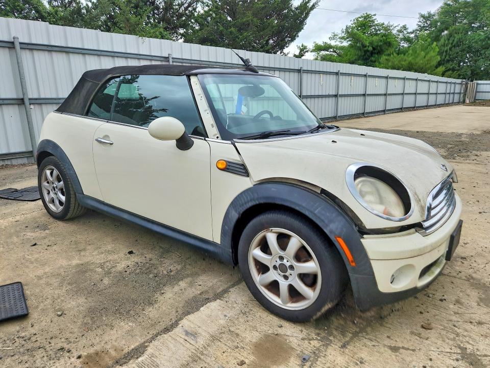 Photo 4 from auction – 2010 MINI COOPER with VIN WMWMR3C54ATZ19769