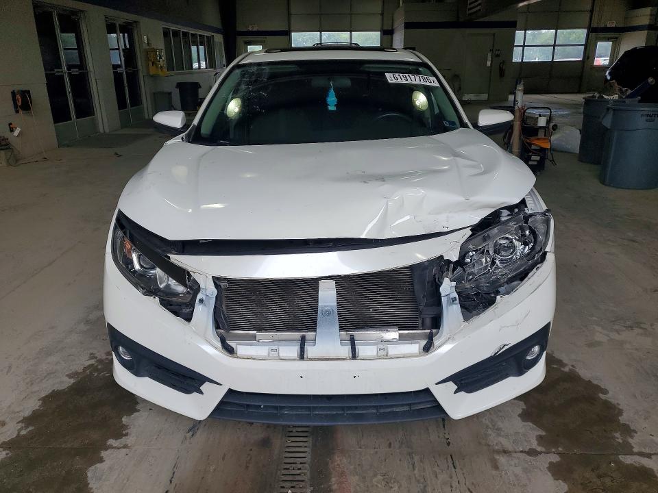 Photo 5 from auction – 2018 HONDA CIVIC with VIN JHMFC1F35JX006604