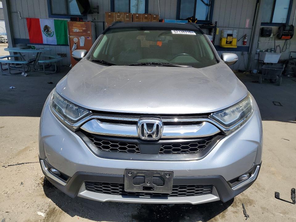 Photo 5 from auction – 2017 HONDA CR-V with VIN 7FARW1H9XHE022670