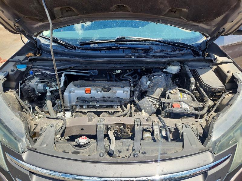 Photo 11 from auction – 2014 HONDA CR-V with VIN 2HKRM4H33EH714068