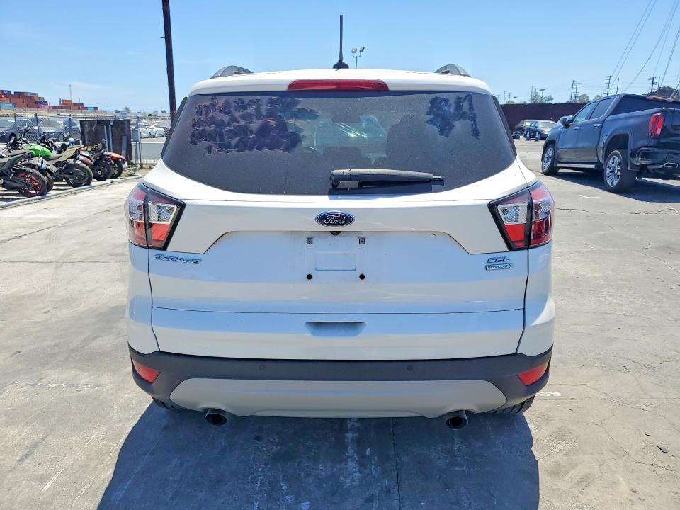 Foto 6 de la subasta – 2018 FORD ESCAPE con VIN 1FMCU0HD7JUB13880