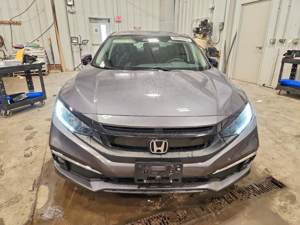 Photo 5 from auction – 2019 HONDA CIVIC with VIN 19XFC1F33KE002702