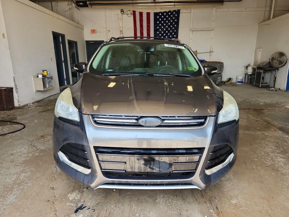 Photo 5 from auction – 2015 FORD ESCAPE with VIN 1FMCU9J9XFUC22707