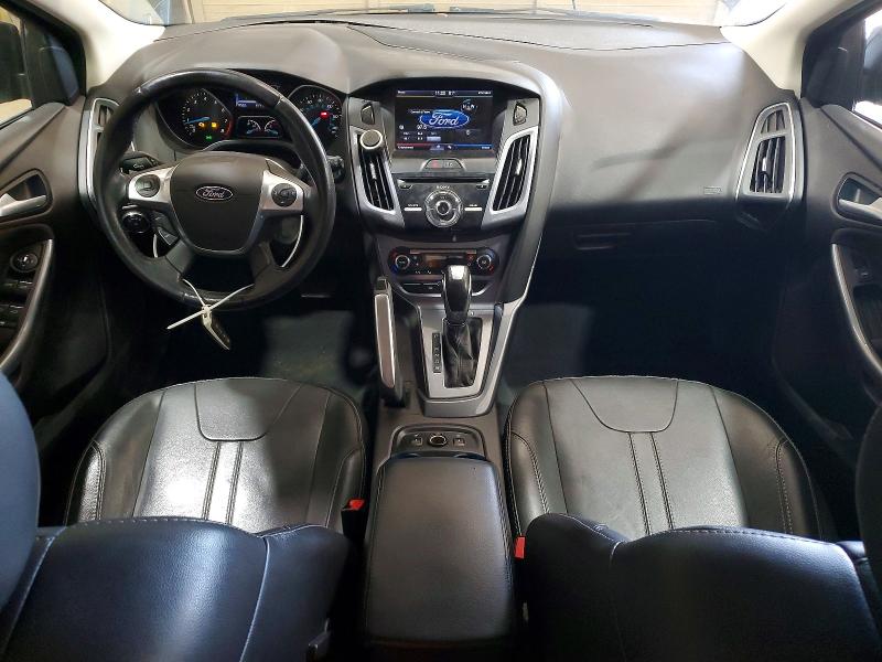 Photo 8 from auction – 2014 FORD FOCUS with VIN 1FADP3N26EL121796