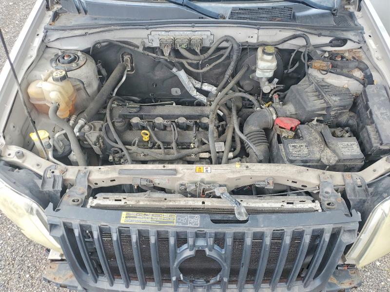 Photo 11 from auction – 2009 MERCURY MARINER with VIN 4M2CU97719KJ16909