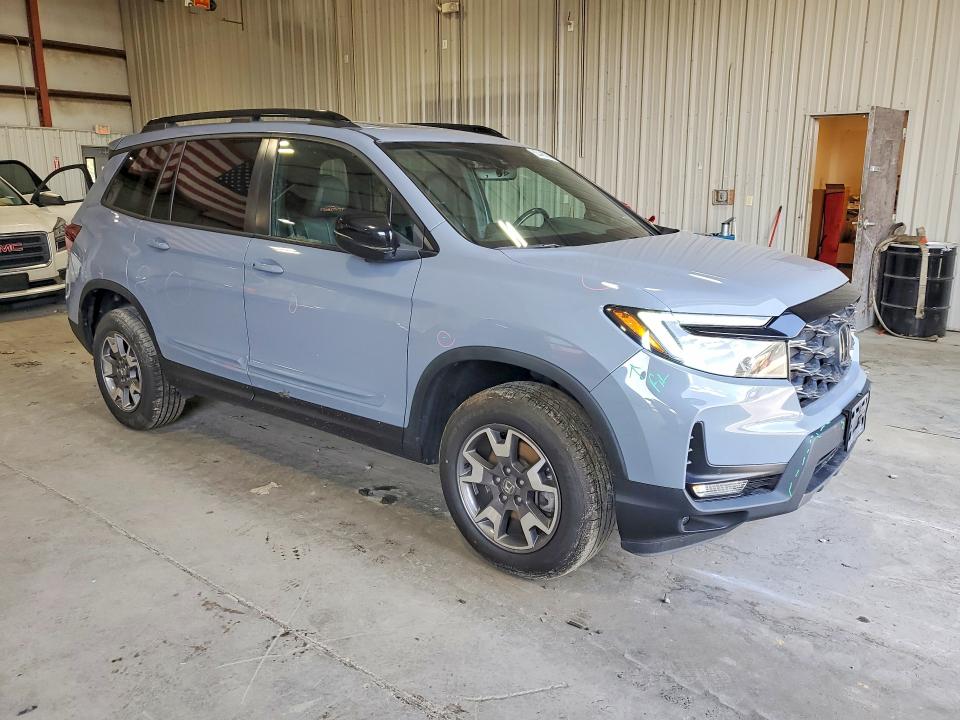 Photo 4 from auction – 2022 HONDA PASSPORT with VIN 5FNYF8H66NB024725