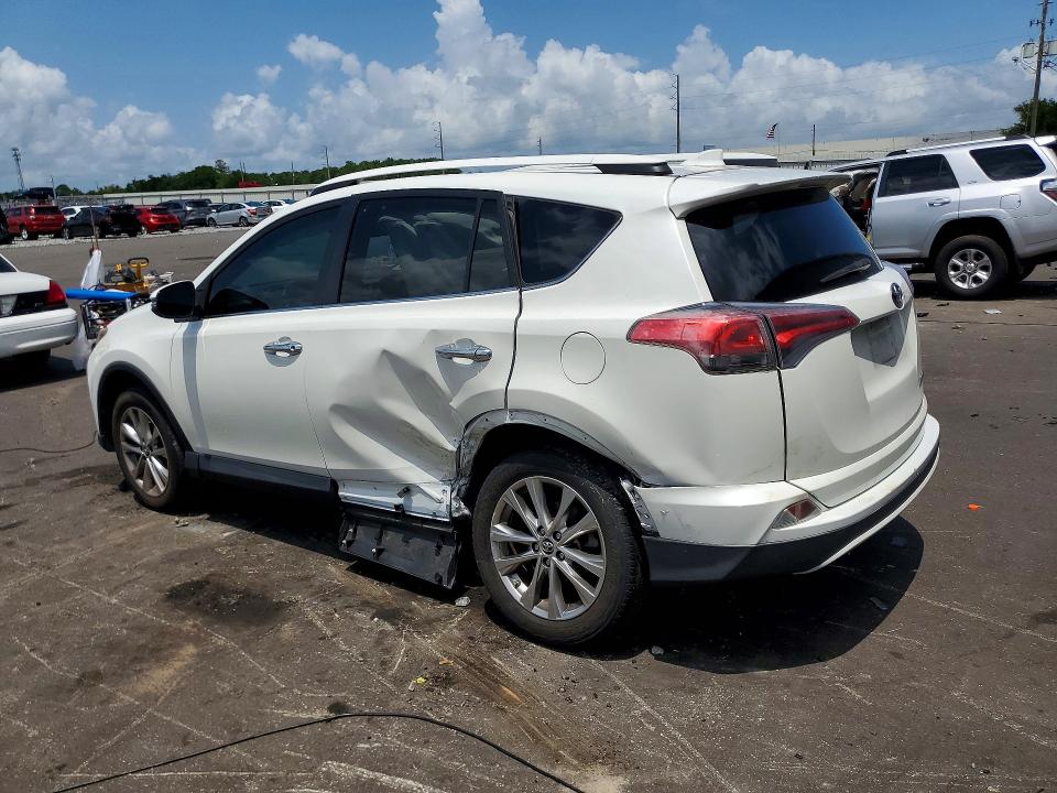 Photo 2 from auction – 2018 TOYOTA RAV4 with VIN 2T3YFREV7JW448811