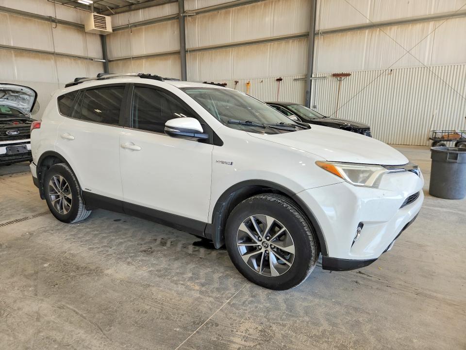 Photo 4 from auction – 2016 TOYOTA RAV4 HV with VIN JTMRJREV8GD033585