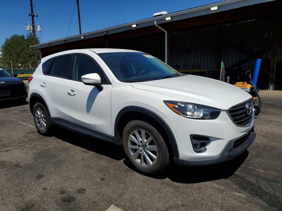 Photo 4 from auction – 2016 MAZDA CX-5 with VIN JM3KE2CY9G0689061