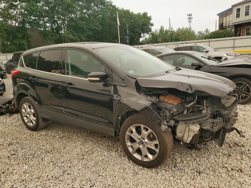 Photo 4 from auction – 2013 FORD ESCAPE with VIN 1FMCU9H92DUC47619