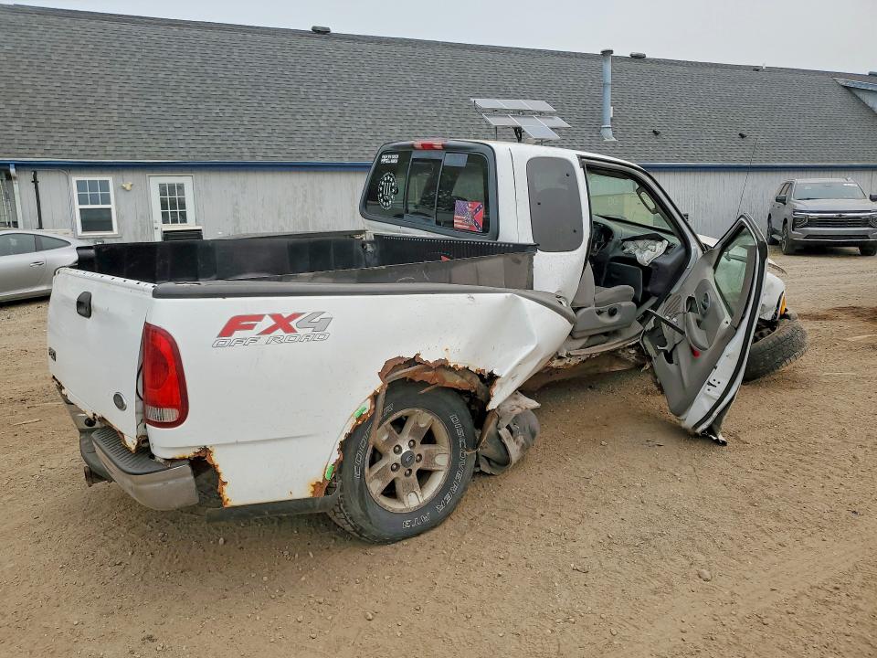 Photo 3 from auction – 2003 FORD F150 with VIN 1FTRX18L03NB42928