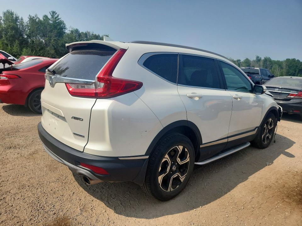 Photo 3 from auction – 2018 HONDA CR-V with VIN 2HKRW2H90JH137948