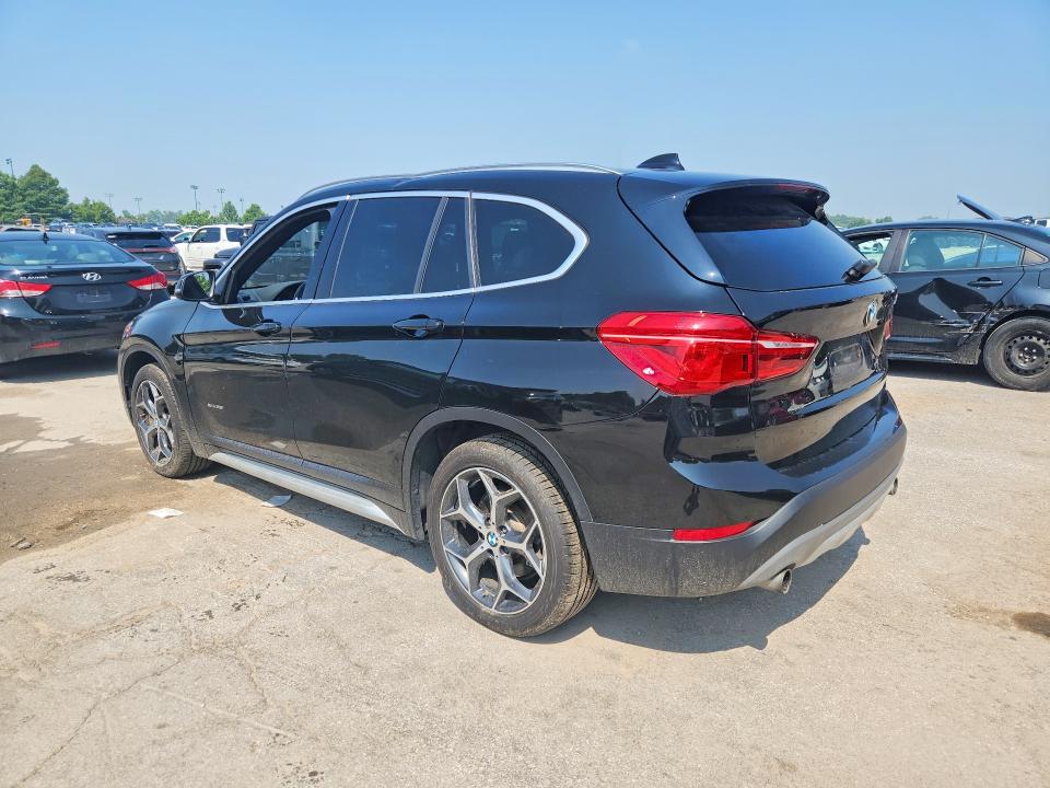 Photo 2 from auction – 2016 BMW X1 with VIN WBXHT3C37G5E50328