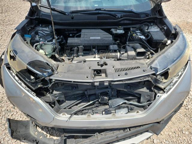 Photo 12 from auction – 2018 HONDA CR-V with VIN 7FARW1H84JE005859