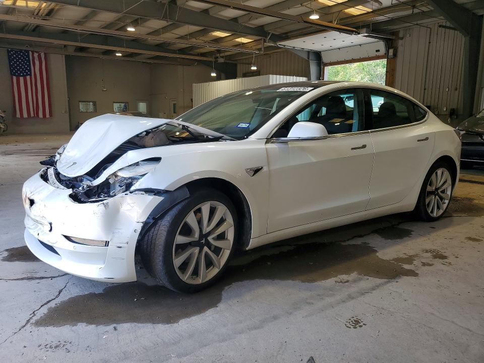 TESLA MODEL 3 2020 with VIN 5YJ3E1EAXLF590915 - Photo from auction