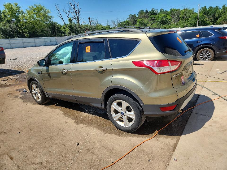 Photo 2 from auction – 2013 FORD ESCAPE with VIN 1FMCU0GX1DUB61391