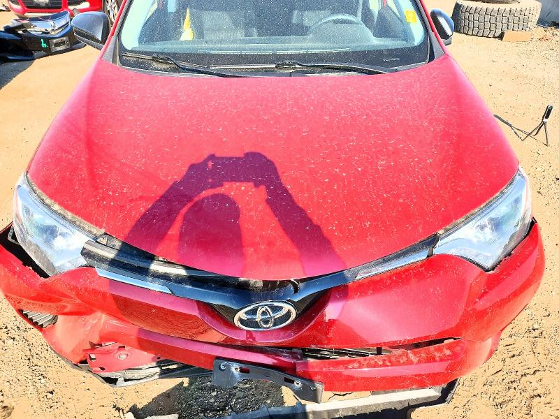 Photo 11 from auction – 2016 TOYOTA RAV4 with VIN JTMBFREV3GJ095416