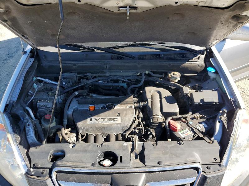 Photo 11 from auction – 2005 HONDA CR-V with VIN JHLRD78855C012149